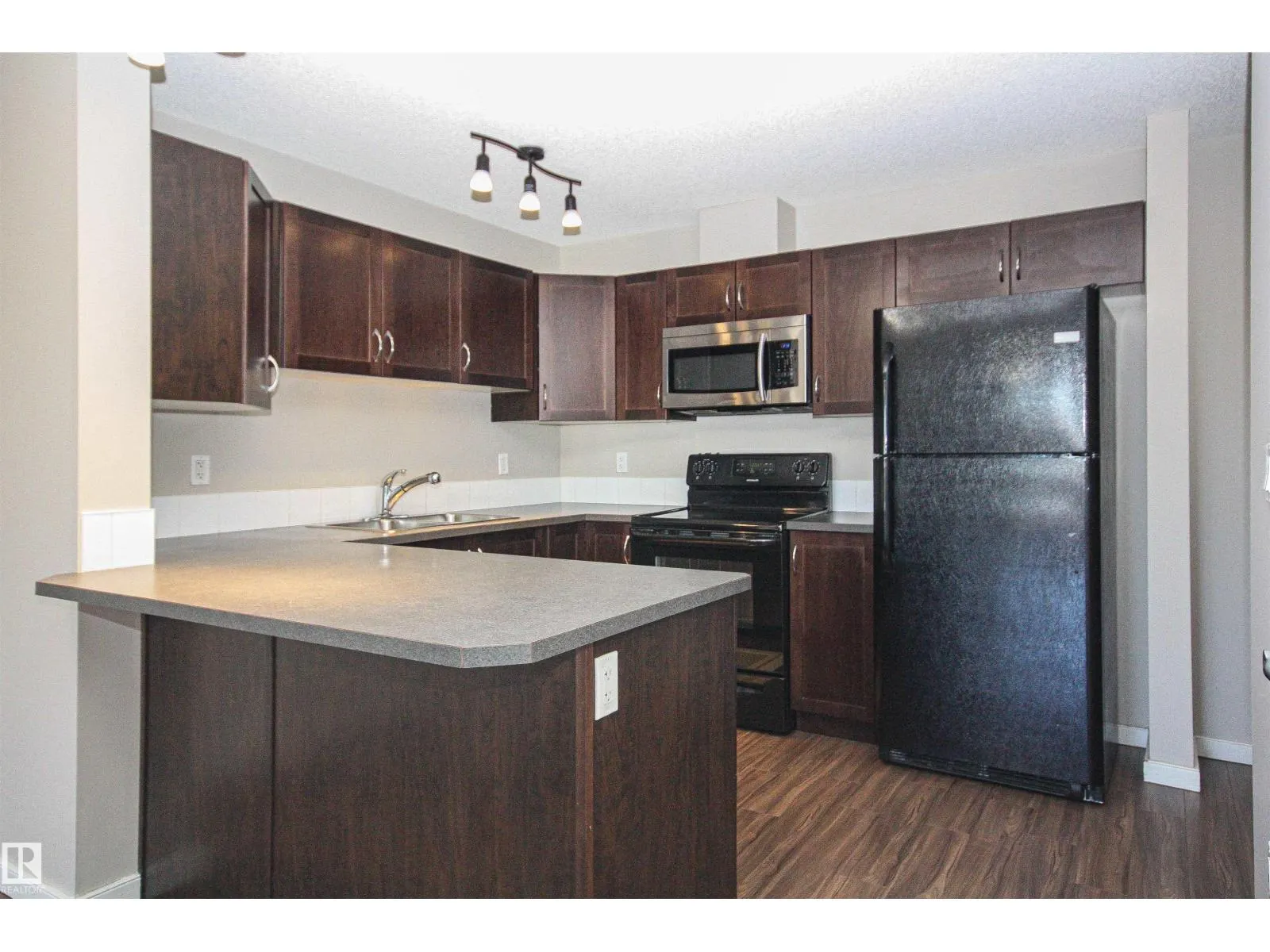 #207 392 SILVER BERRY RD NW