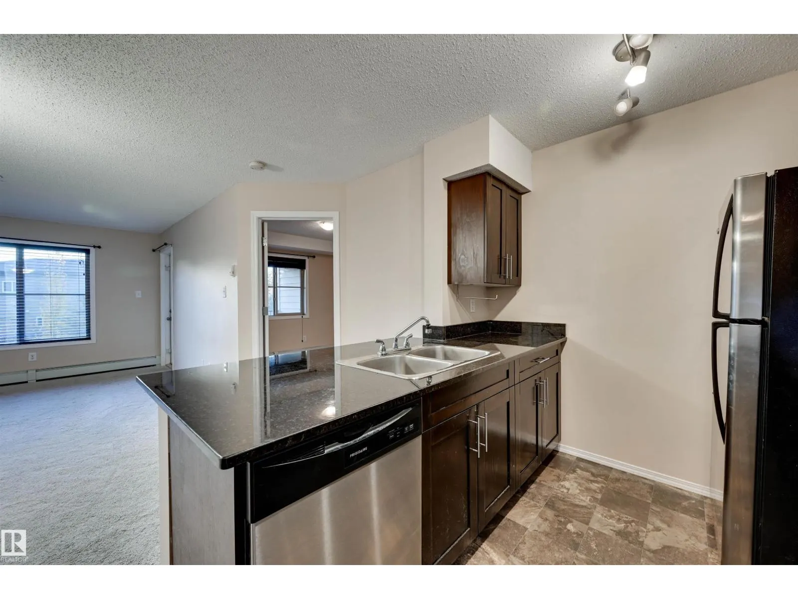 #214 1060 MCCONACHIE BV NW
