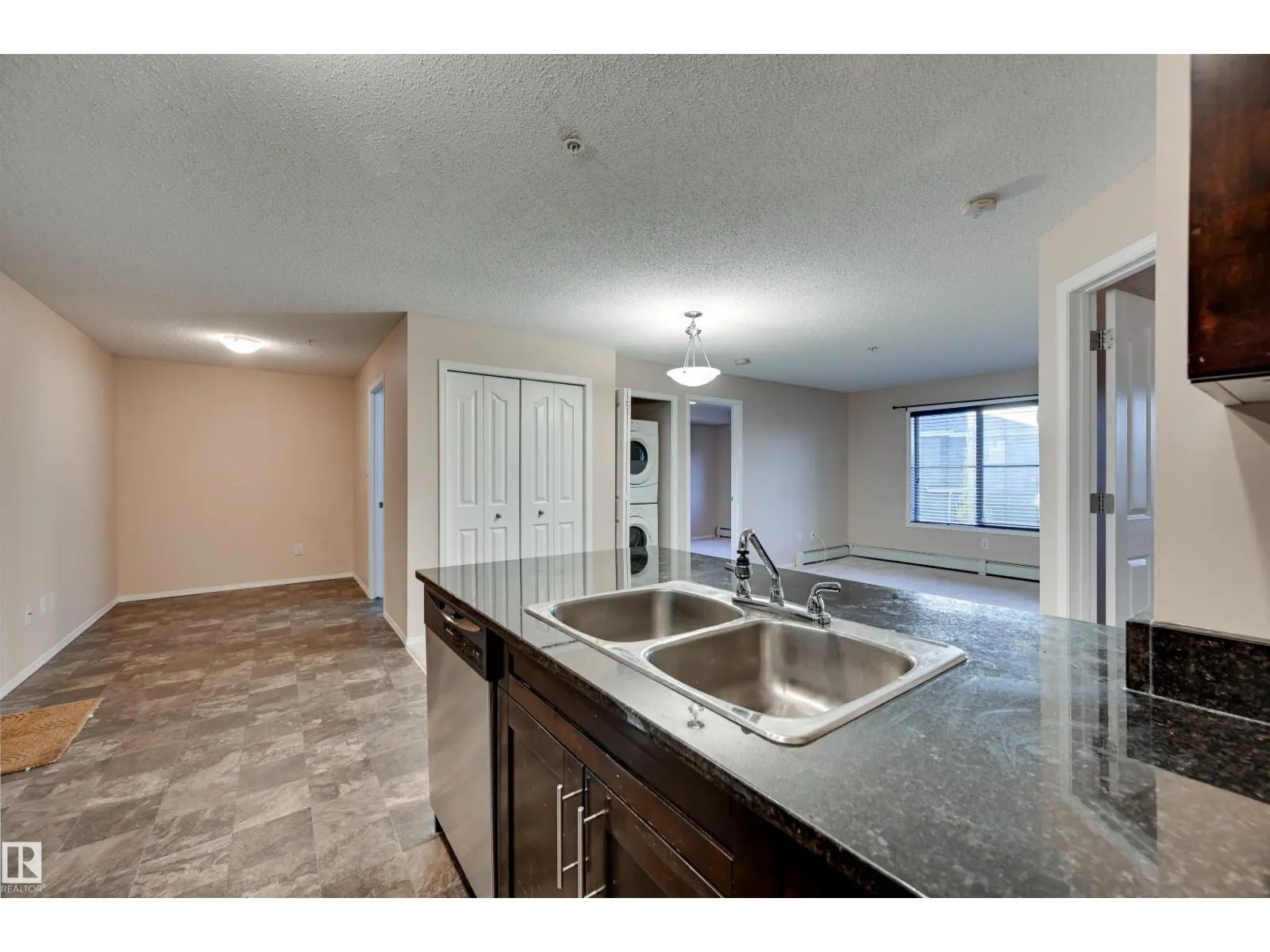 #214 1060 MCCONACHIE BV NW
