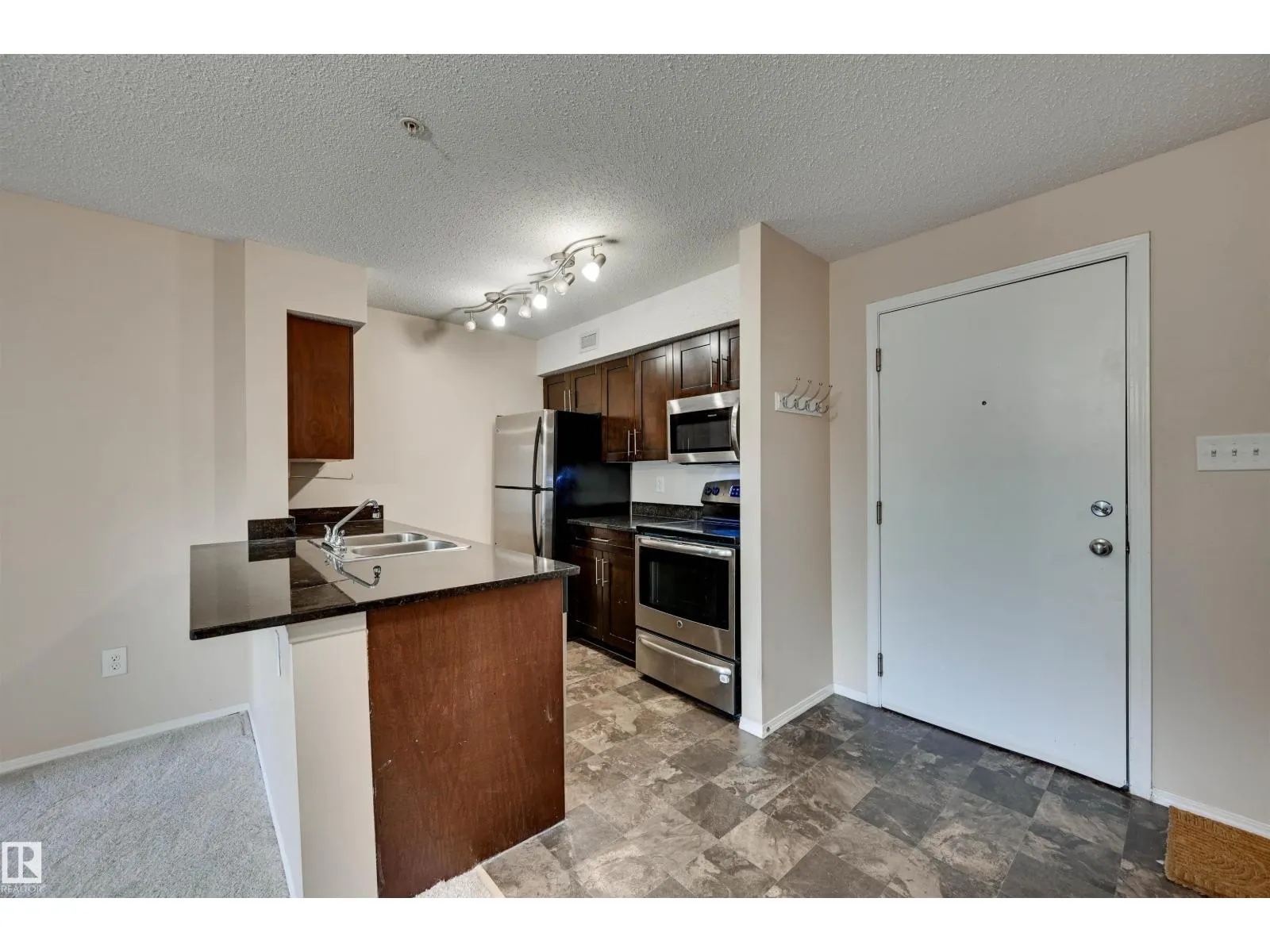 #214 1060 MCCONACHIE BV NW