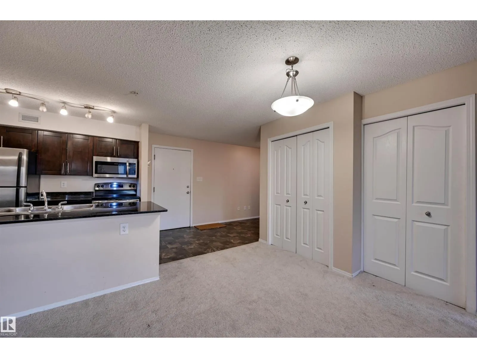 #214 1060 MCCONACHIE BV NW