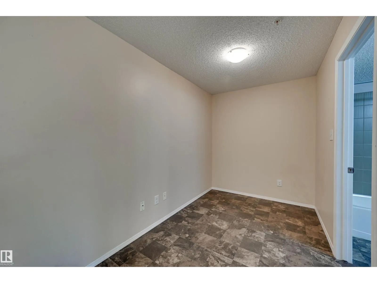 #214 1060 MCCONACHIE BV NW