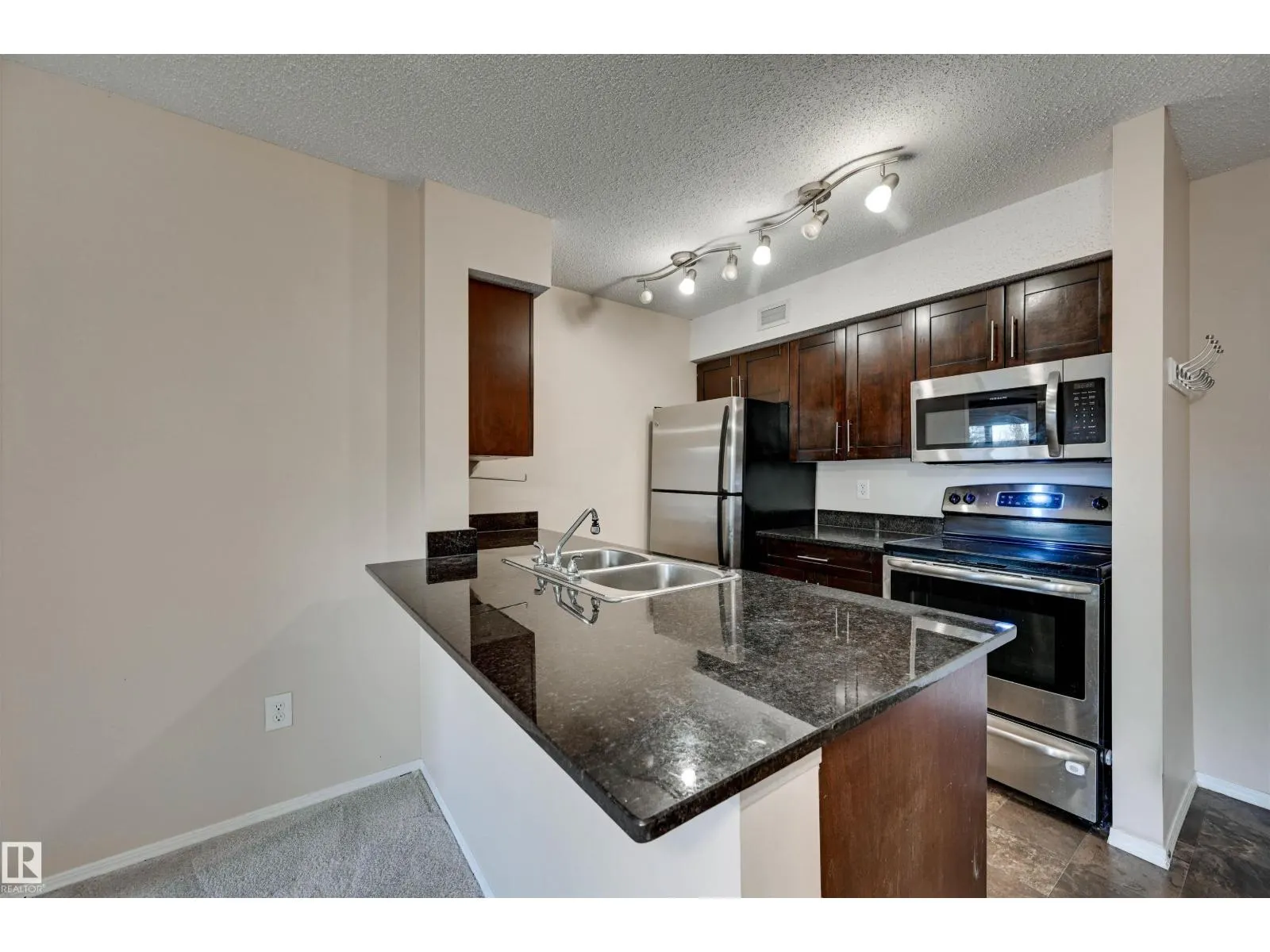 #214 1060 MCCONACHIE BV NW