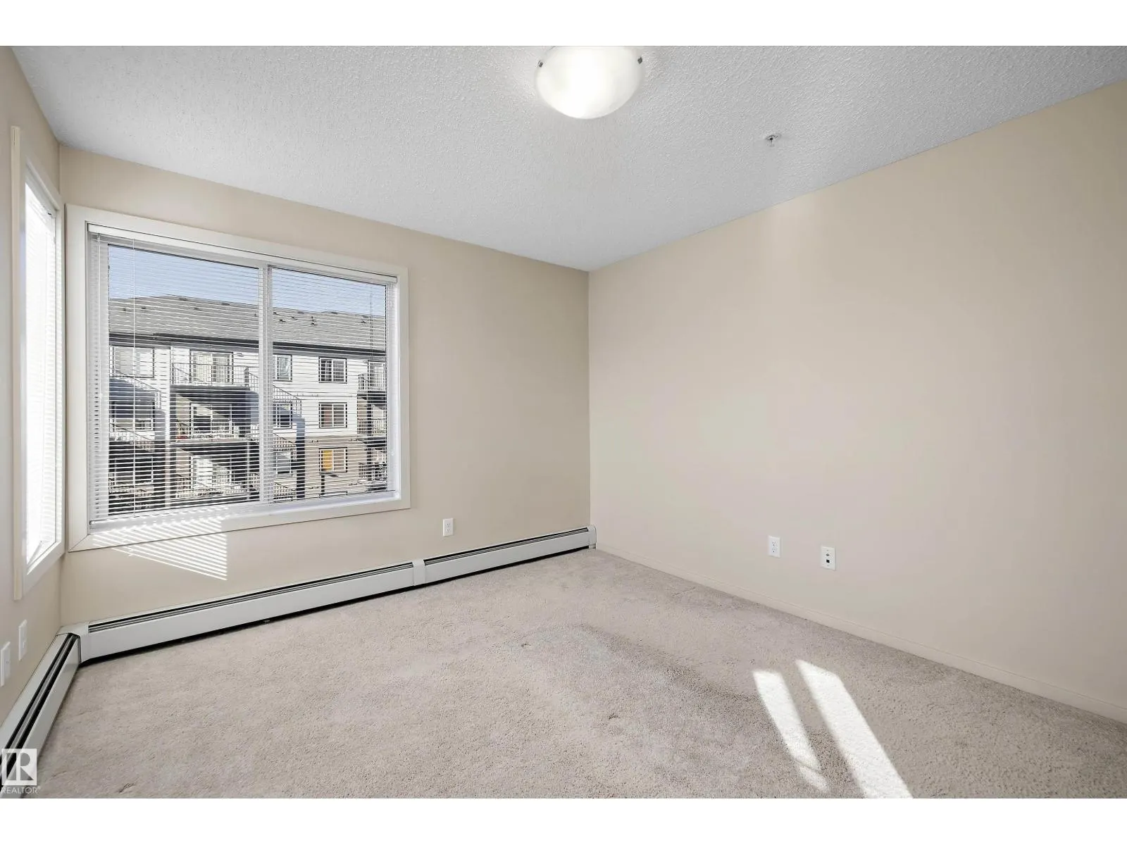 #317 340 WINDERMERE RD NW