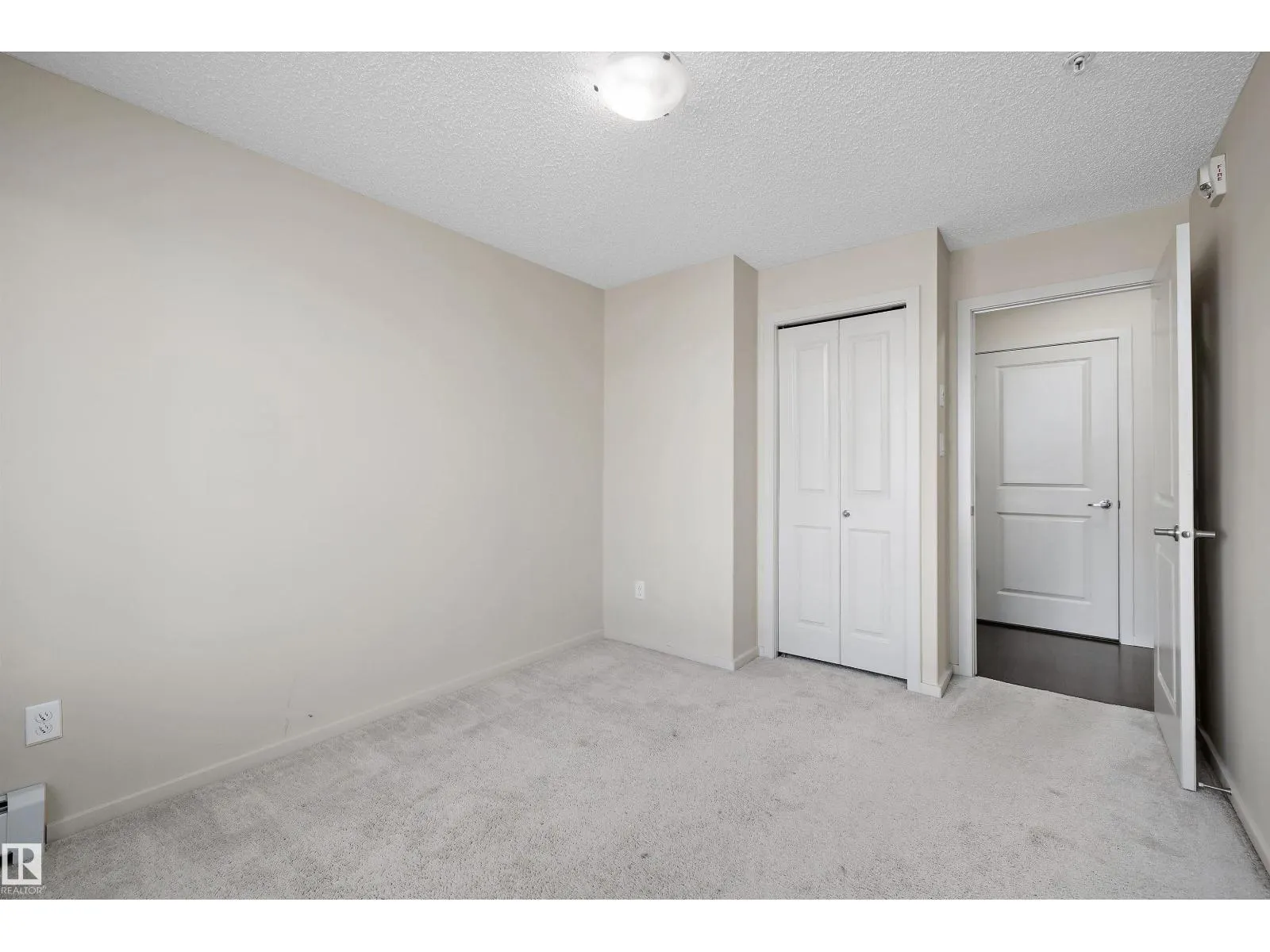#317 340 WINDERMERE RD NW