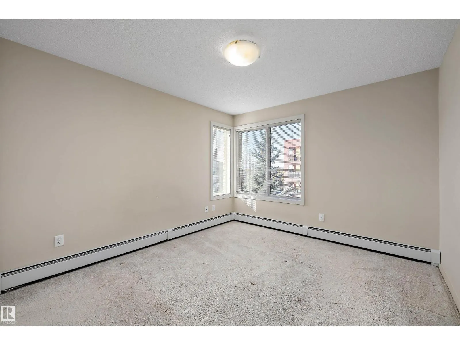 #317 340 WINDERMERE RD NW