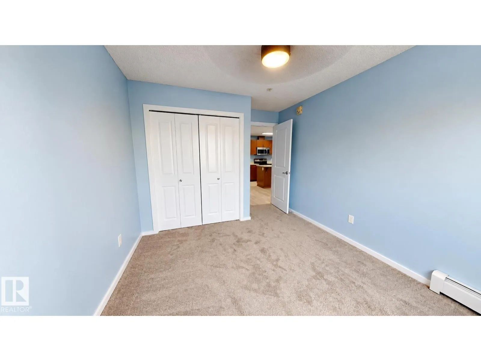 #233 504 Albany WY NW