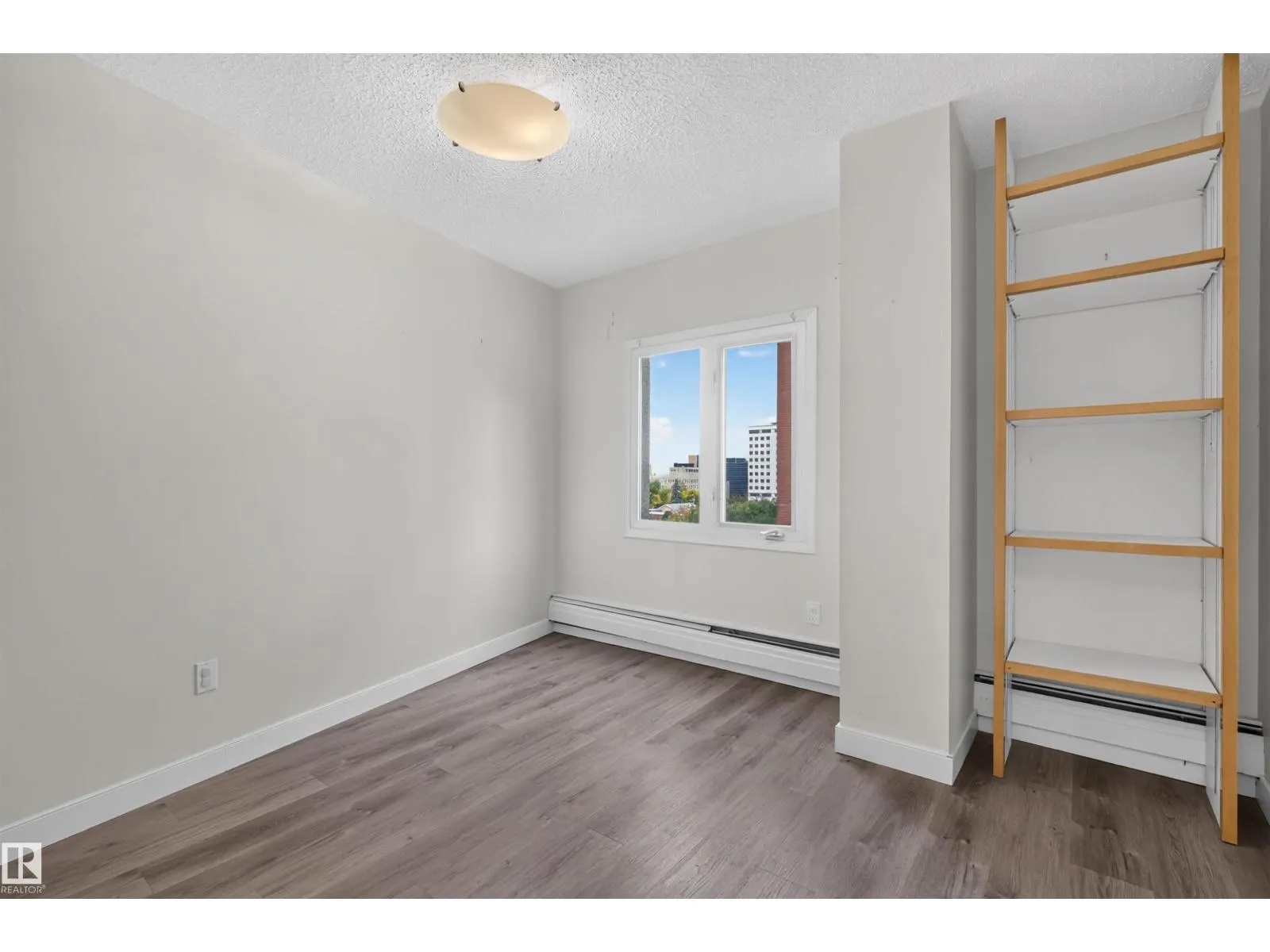 #703 9909 110 ST NW