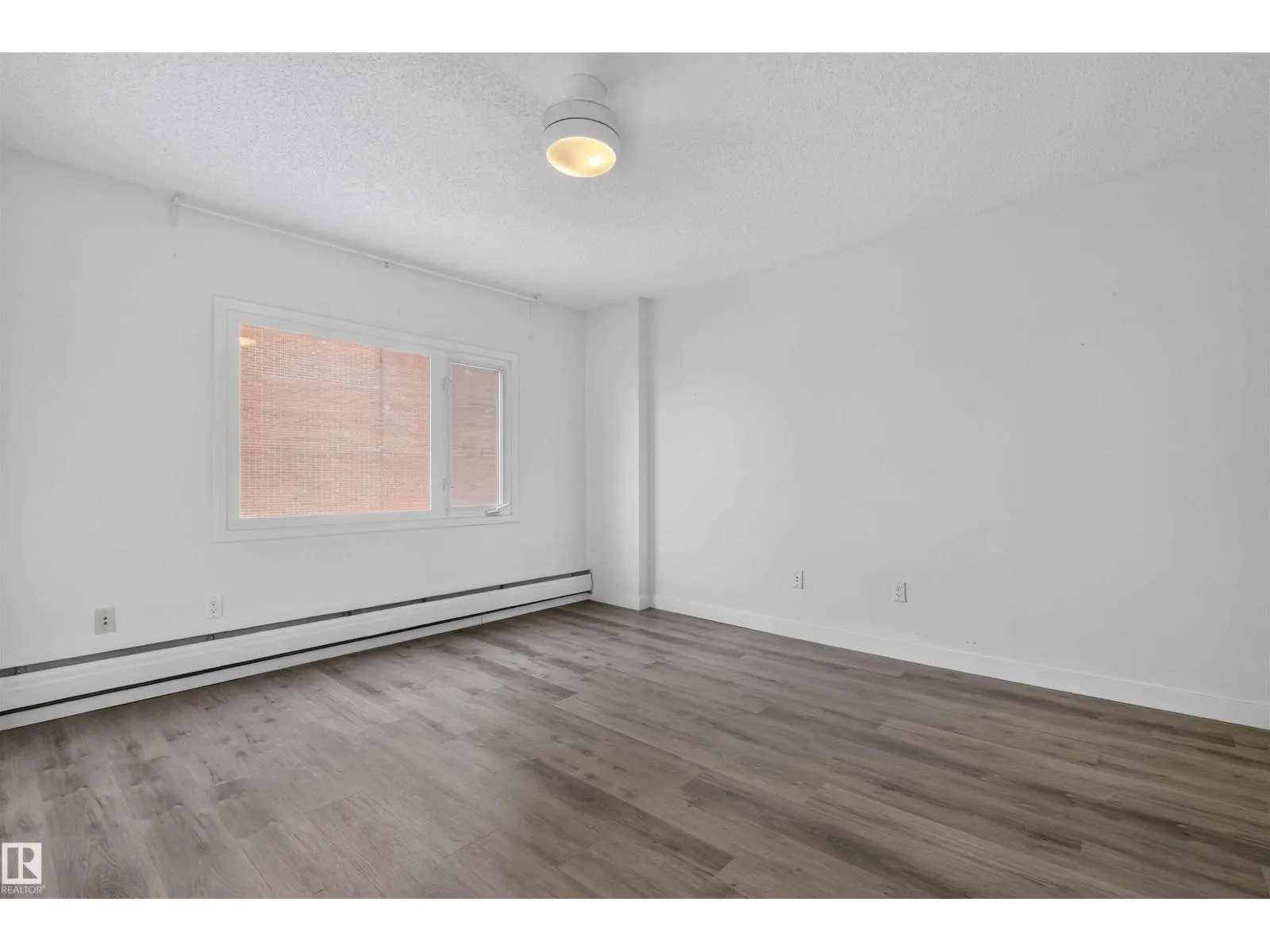 #703 9909 110 ST NW