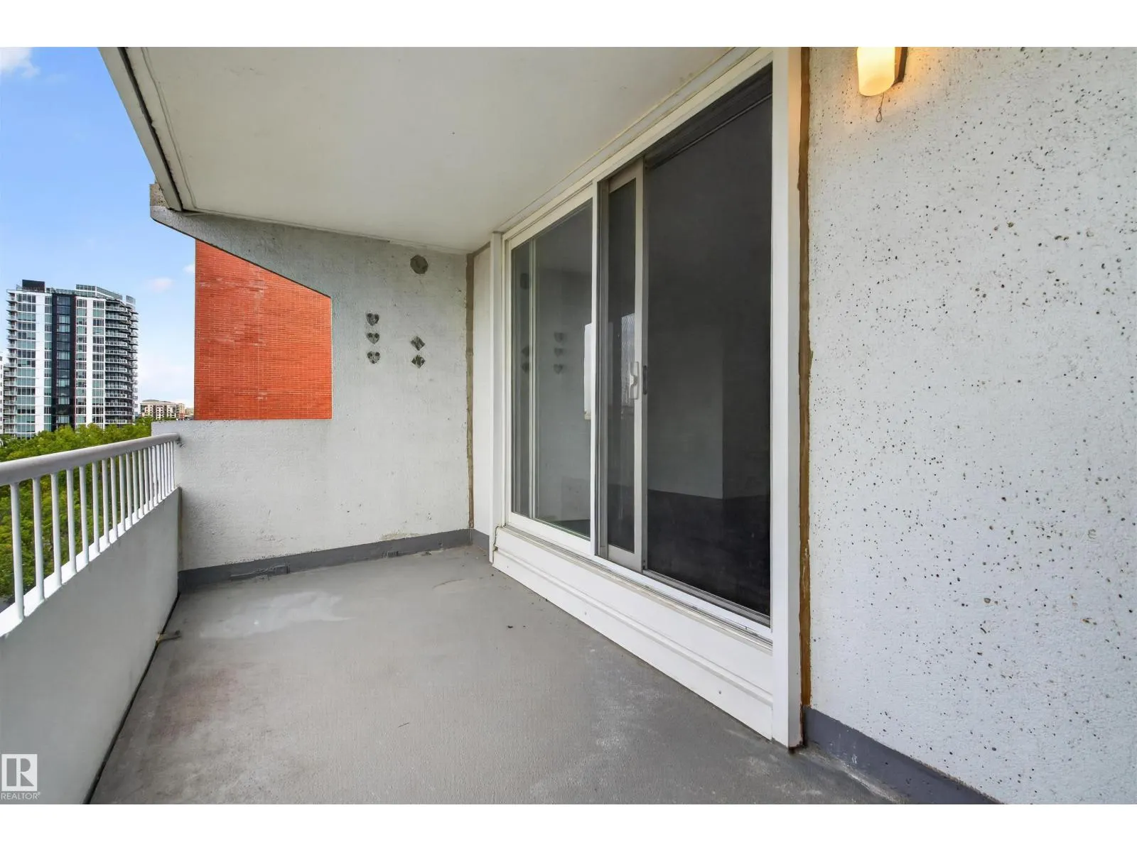 #703 9909 110 ST NW