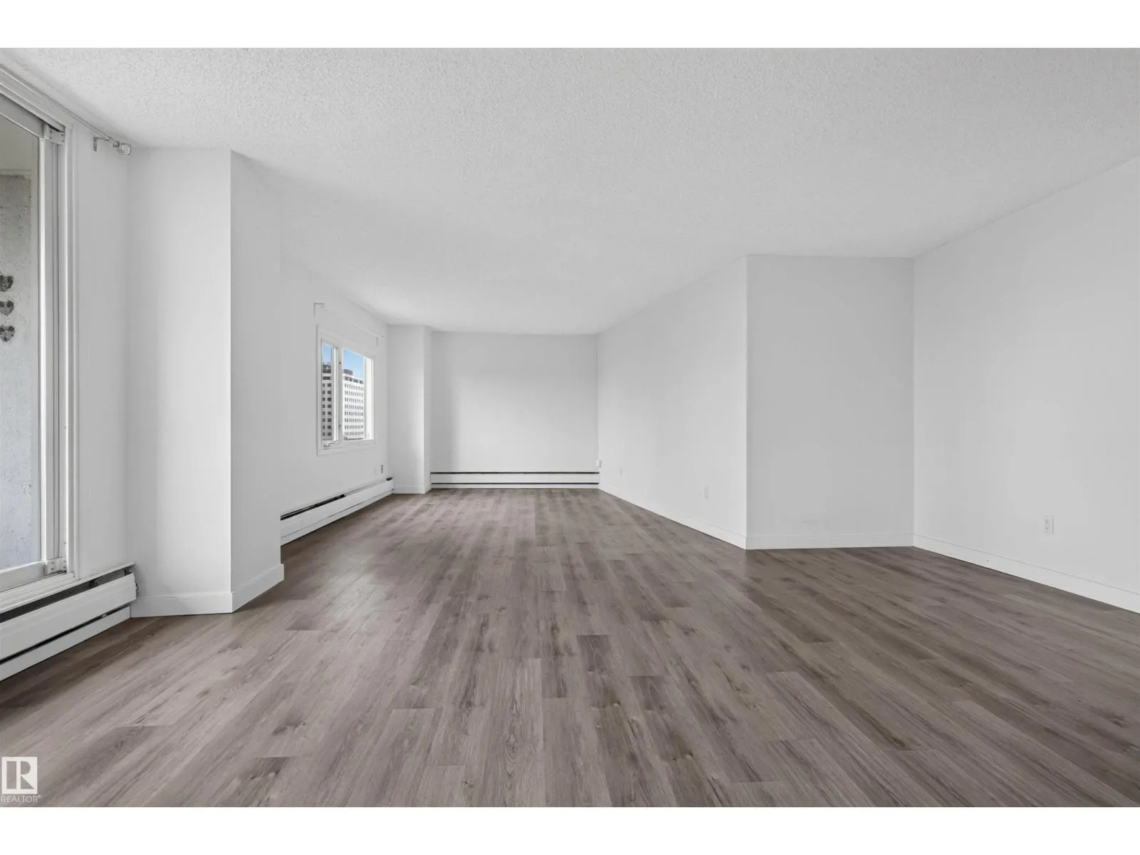 #703 9909 110 ST NW