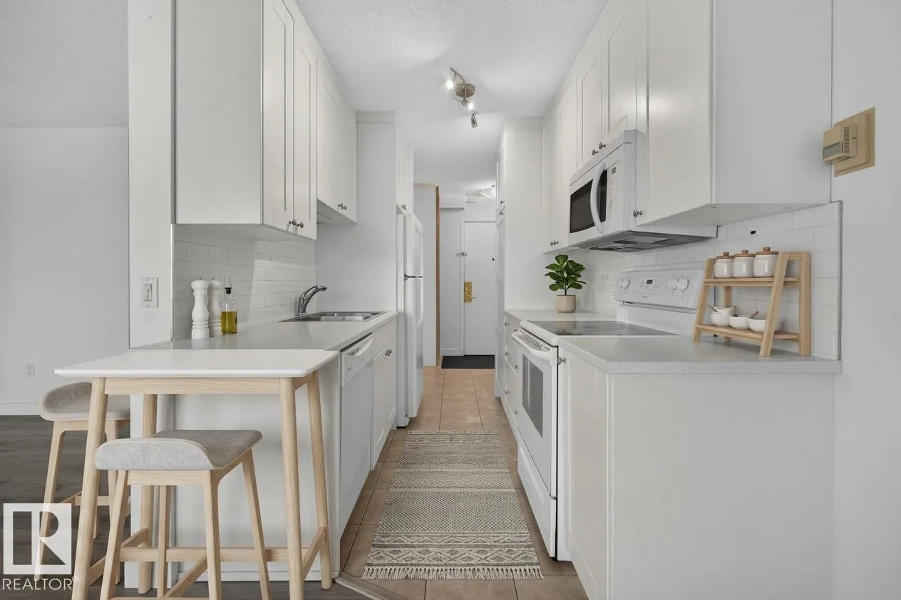 #703 9909 110 ST NW