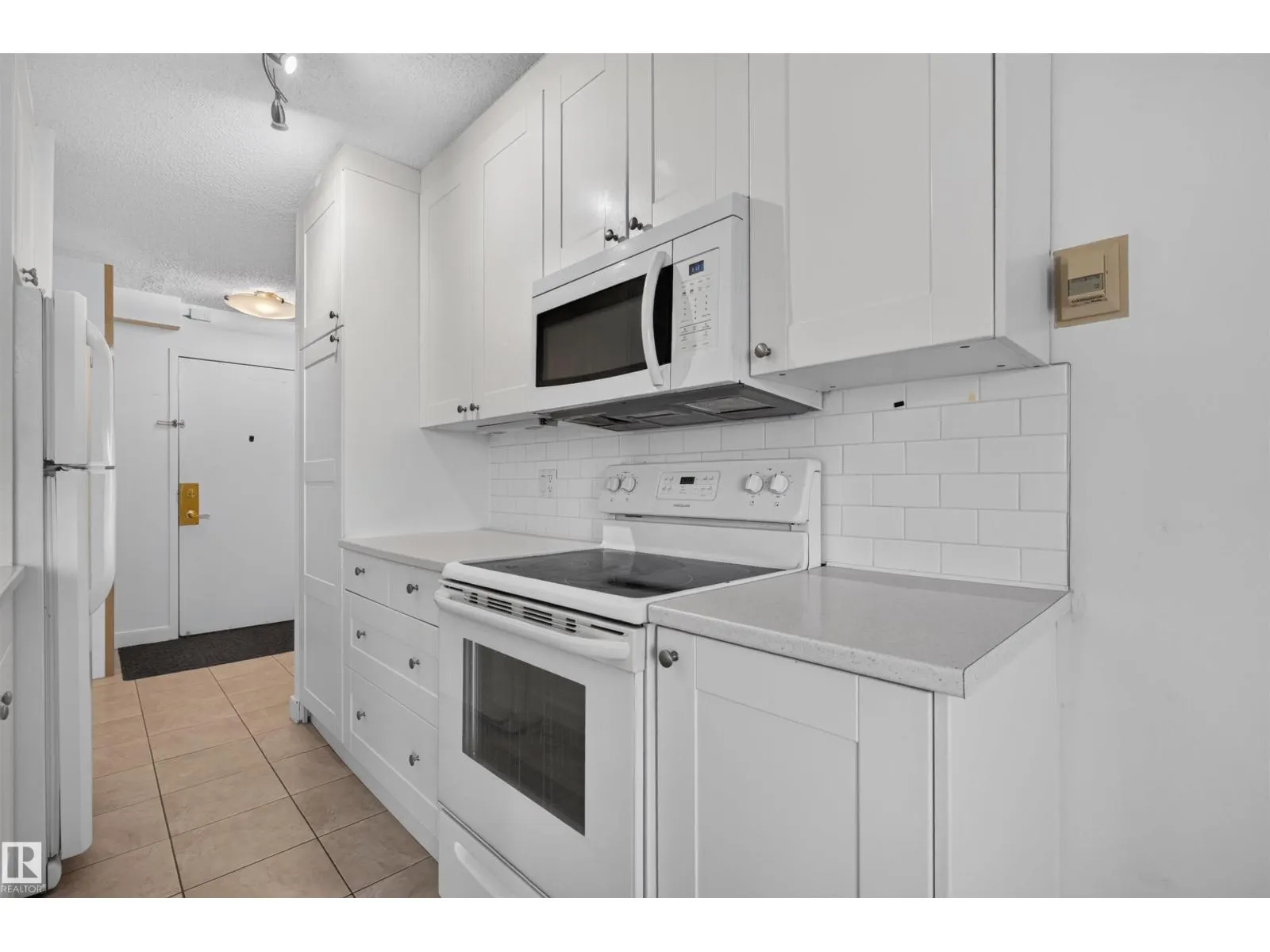 #703 9909 110 ST NW