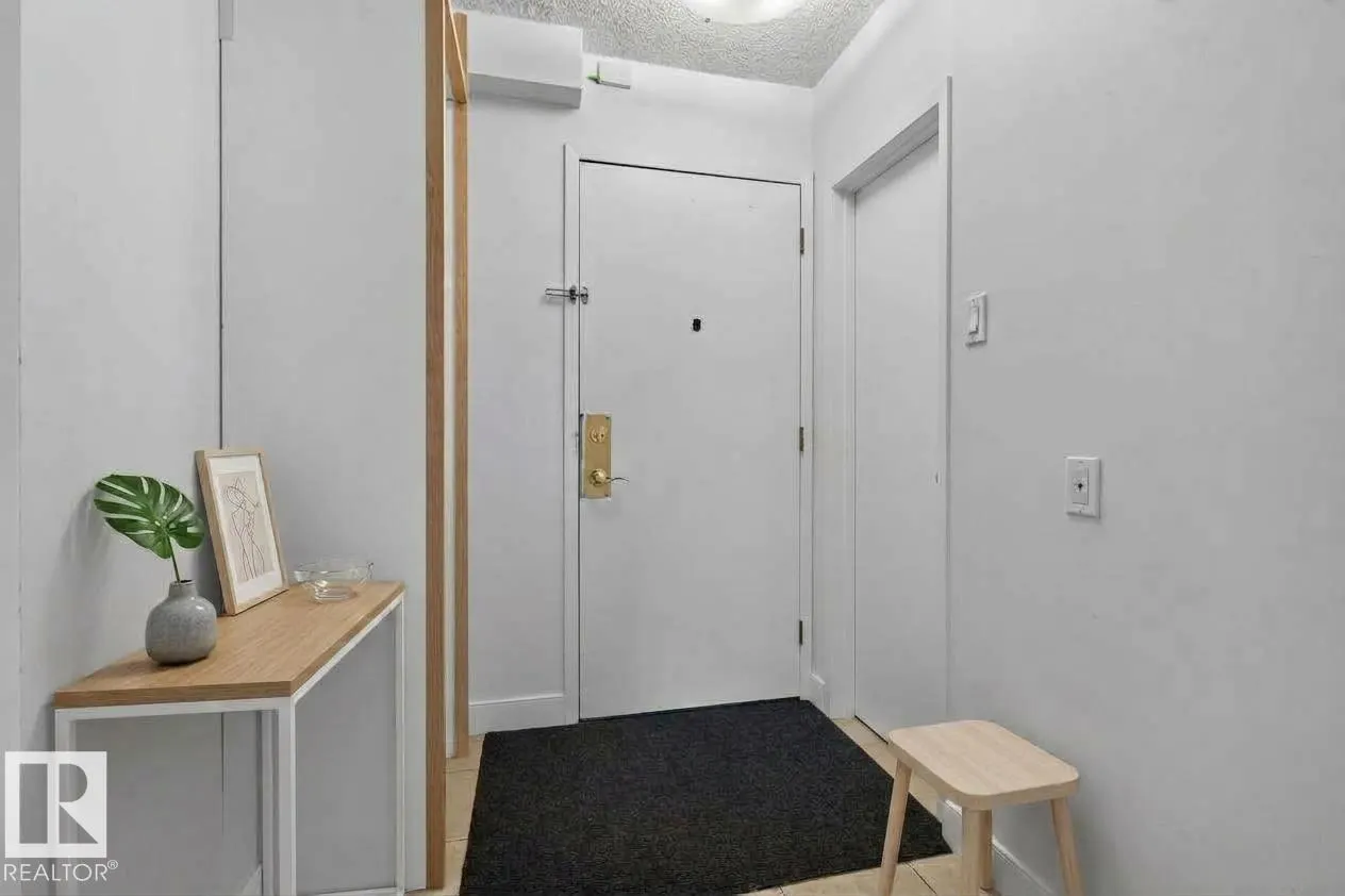 #703 9909 110 ST NW