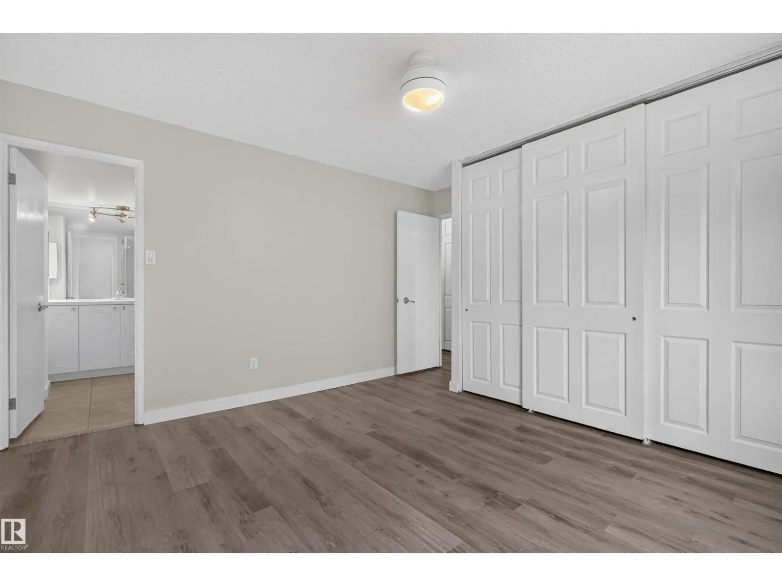 #703 9909 110 ST NW