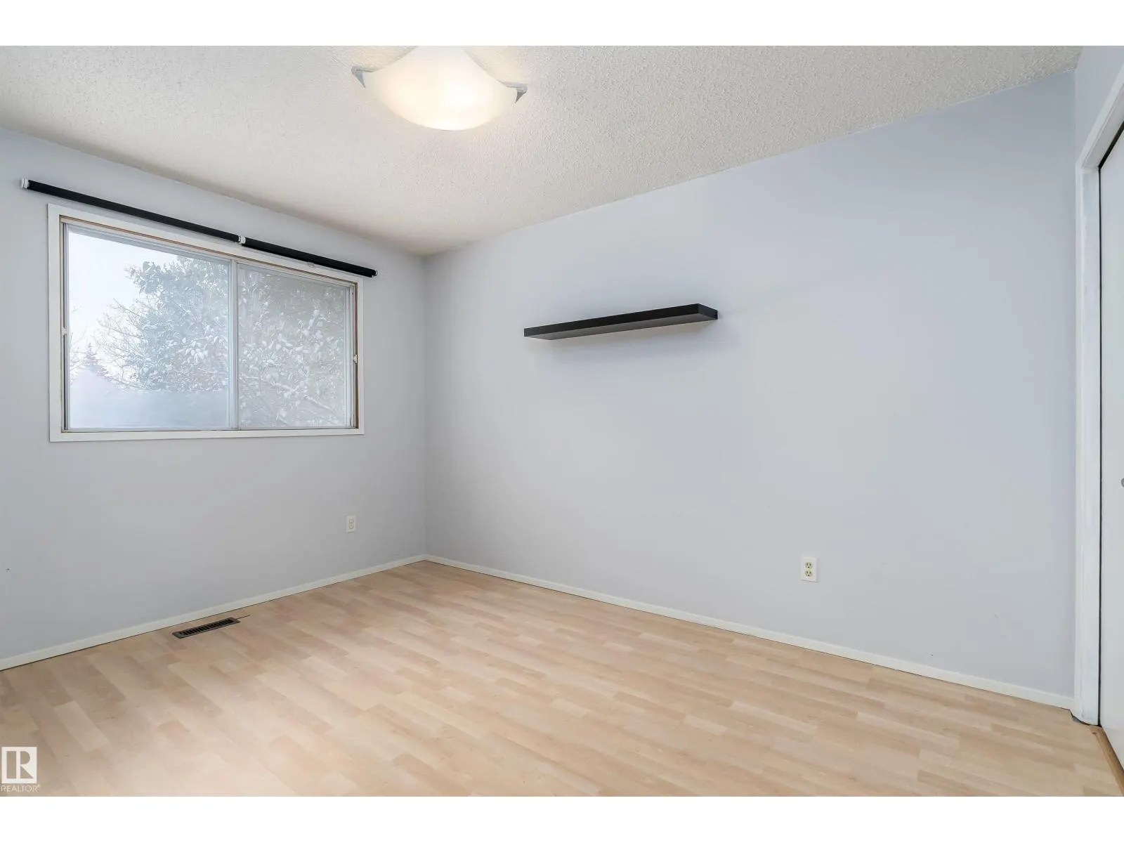 11125 19 AV NW