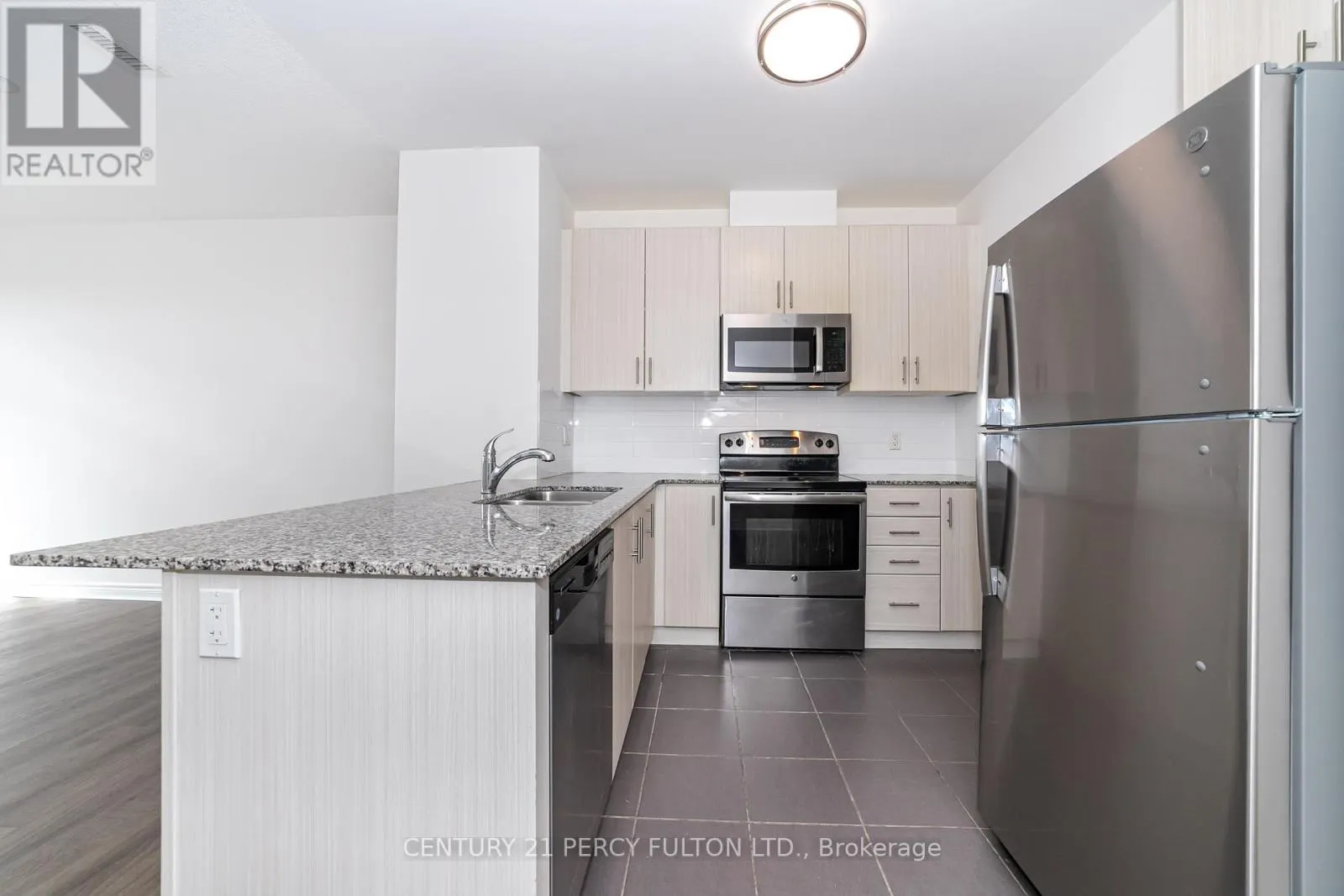 406 - 7768 KENNEDY ROAD