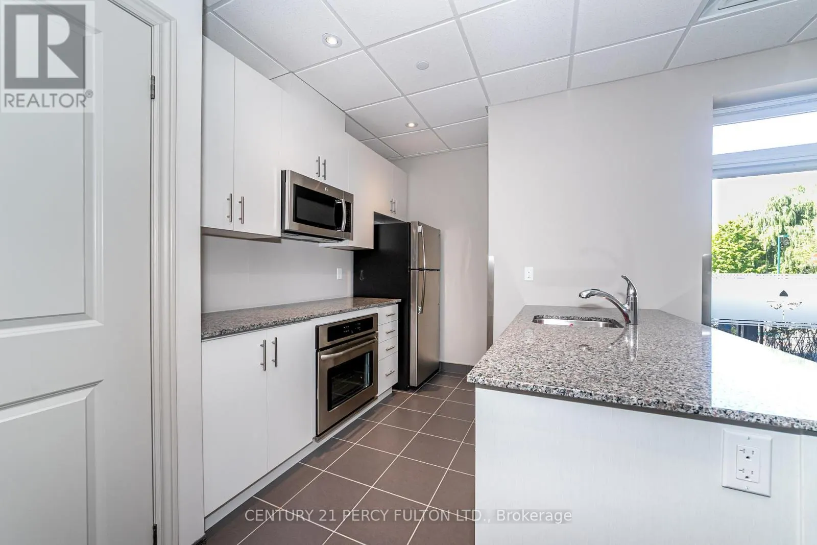 406 - 7768 KENNEDY ROAD