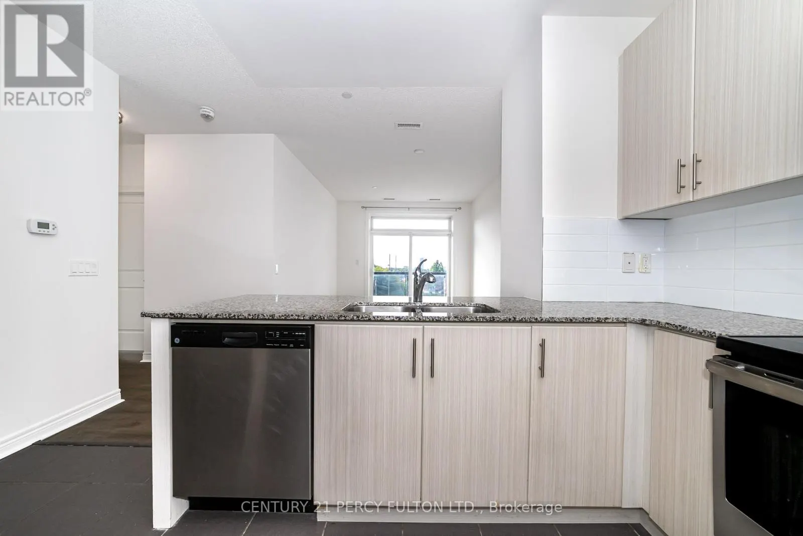 406 - 7768 KENNEDY ROAD