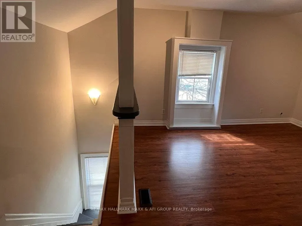 FRONT - 61 WELLINGTON STREET E
