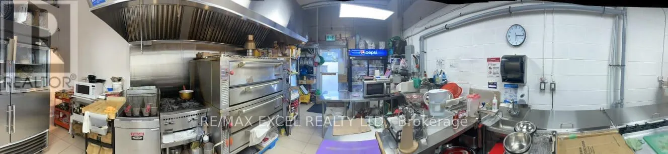 1FC15 - 9390 WOODBINE AVENUE