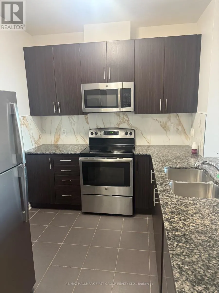 310 - 7768 KENNEDY ROAD