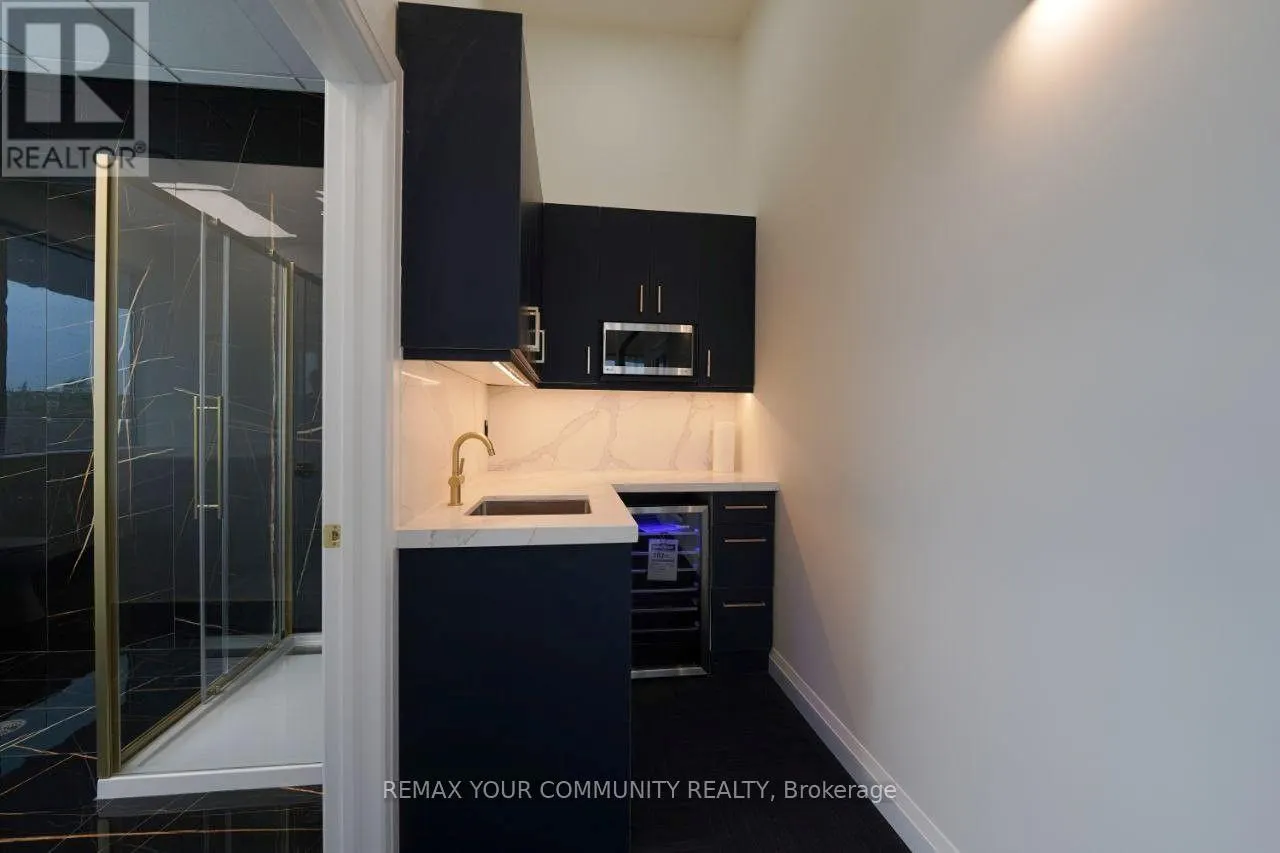 320 - 9390 WOODBINE AVENUE
