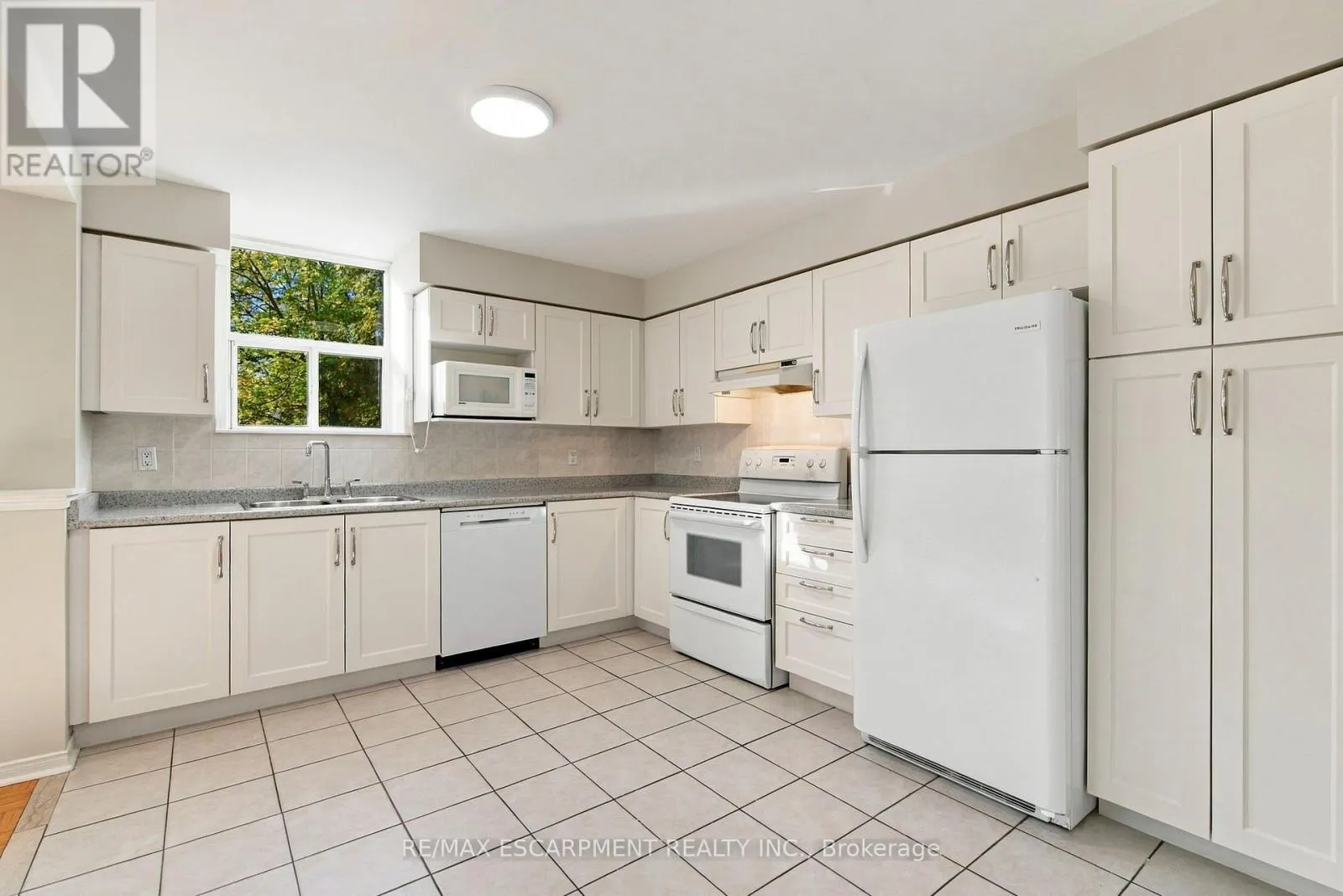 223 - 7373 MARTINGROVE ROAD