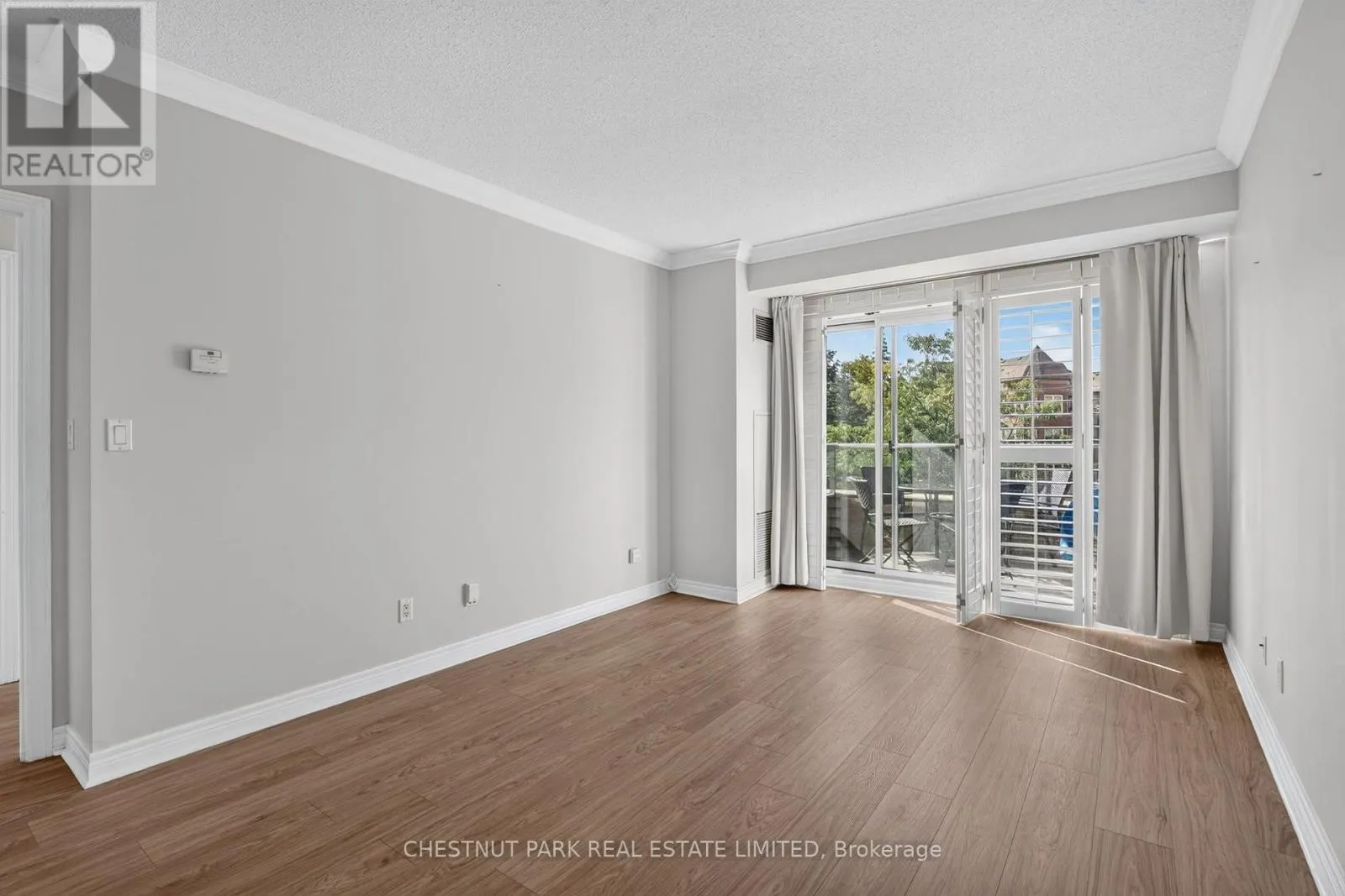 205 - 100 PROMENADE CIRCLE