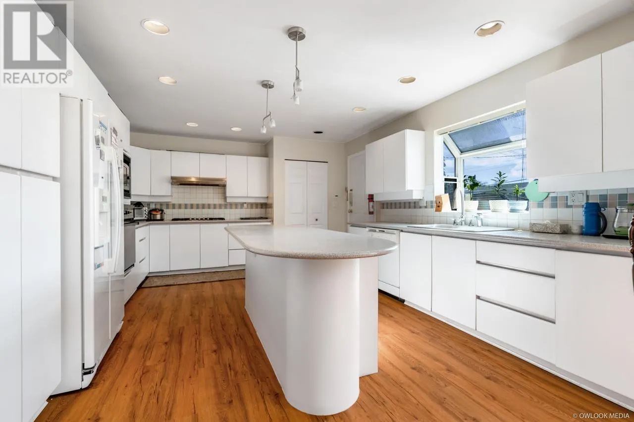 1428 W 58TH AVENUE