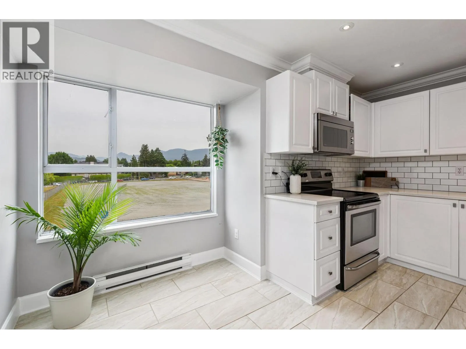 203 2285 PITT RIVER ROAD
