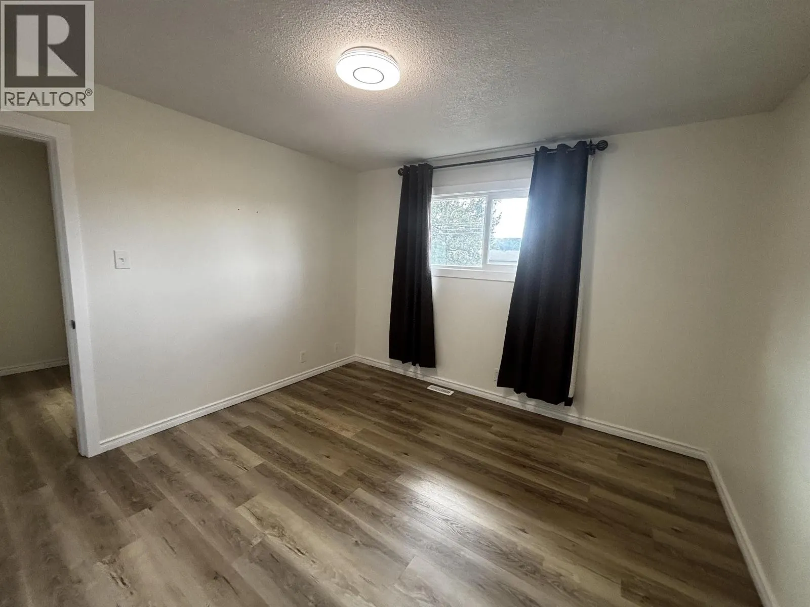 H122 1900 STRATHCONA AVENUE