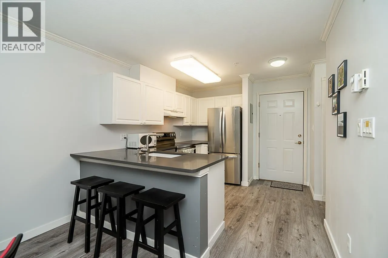 209 5880 DOVER CRESCENT