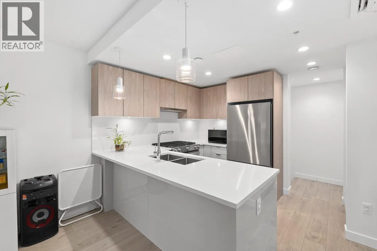 TH1 128 E 8TH STREET