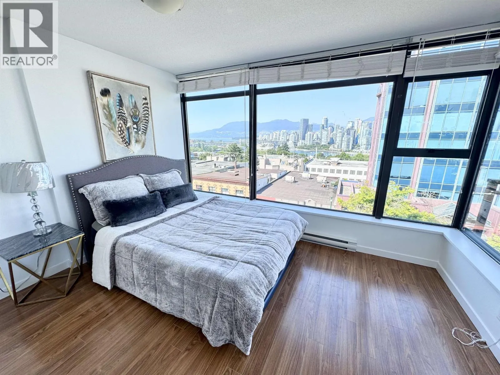 708 1068 W BROADWAY