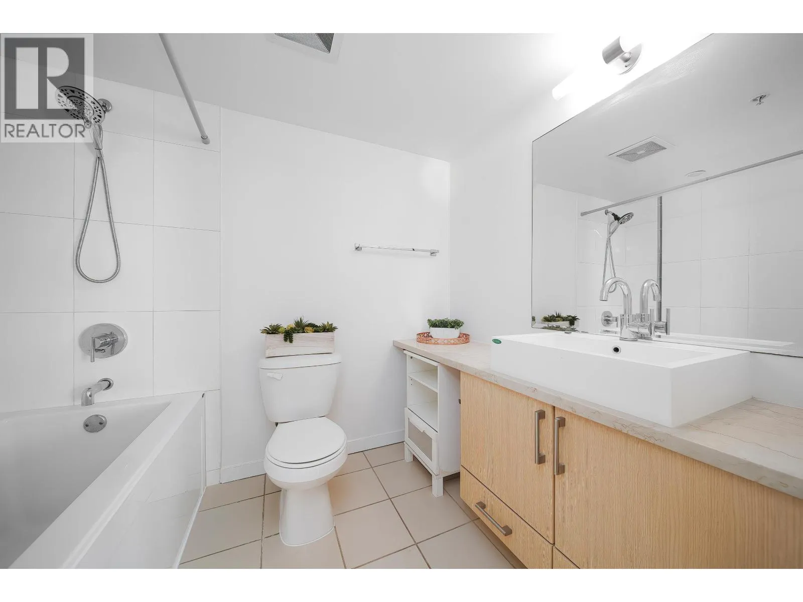 708 1068 W BROADWAY