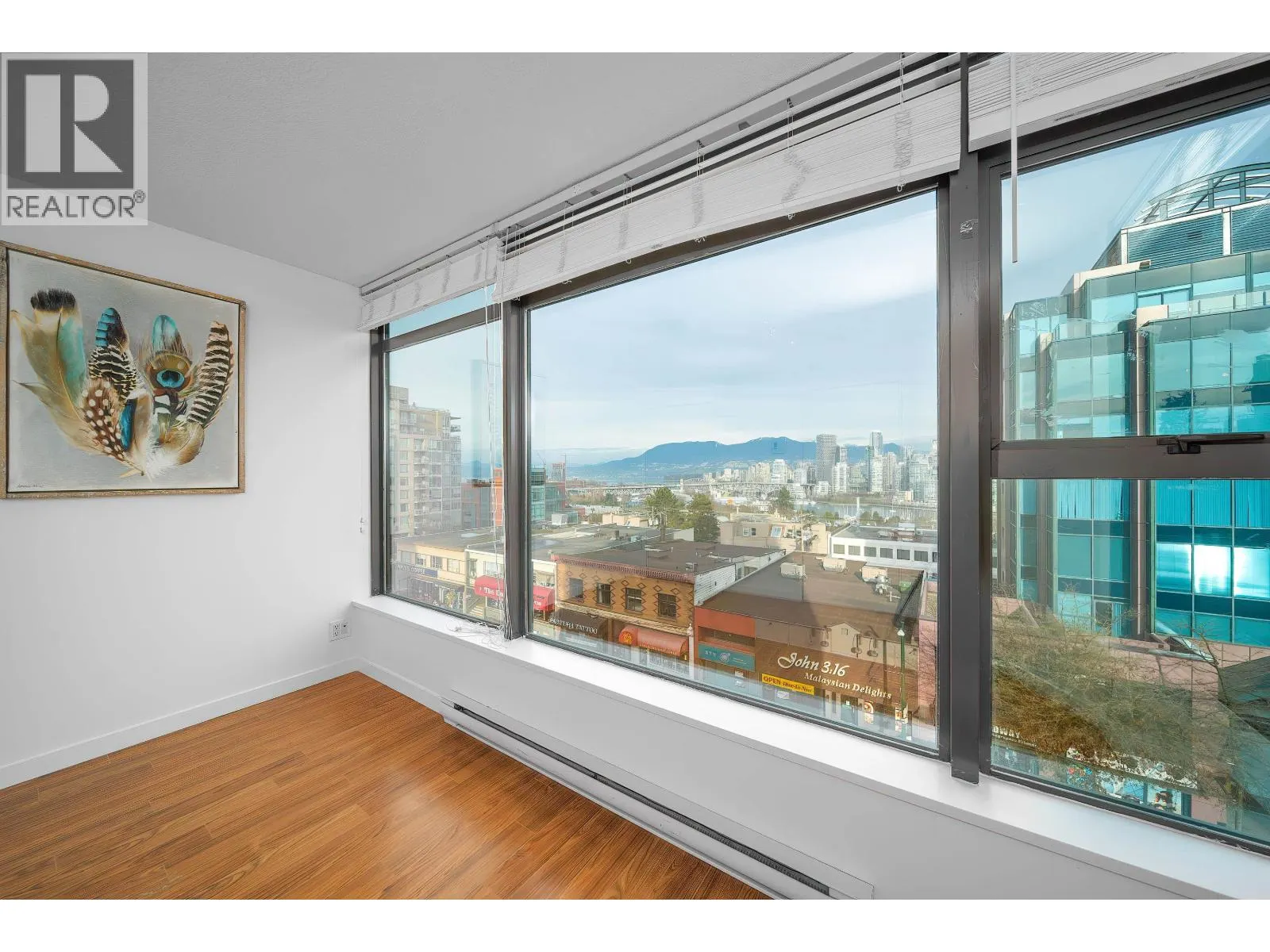 708 1068 W BROADWAY