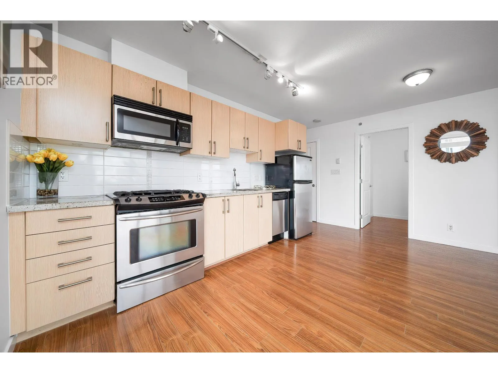 708 1068 W BROADWAY