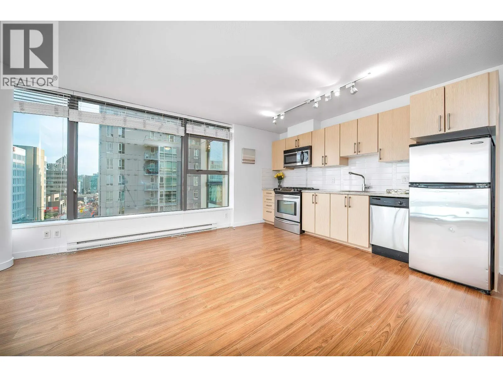 708 1068 W BROADWAY
