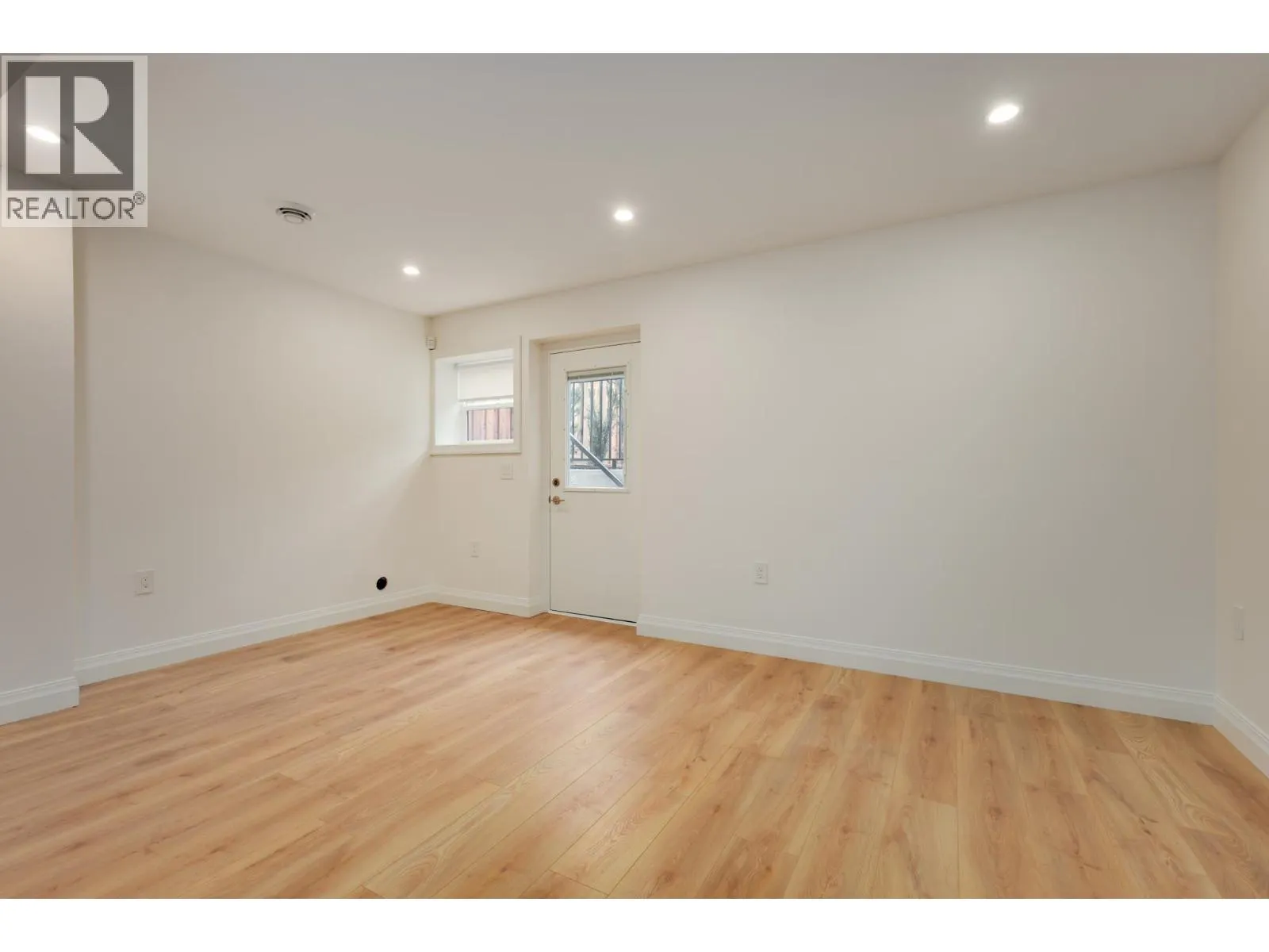 261 E 23RD STREET
