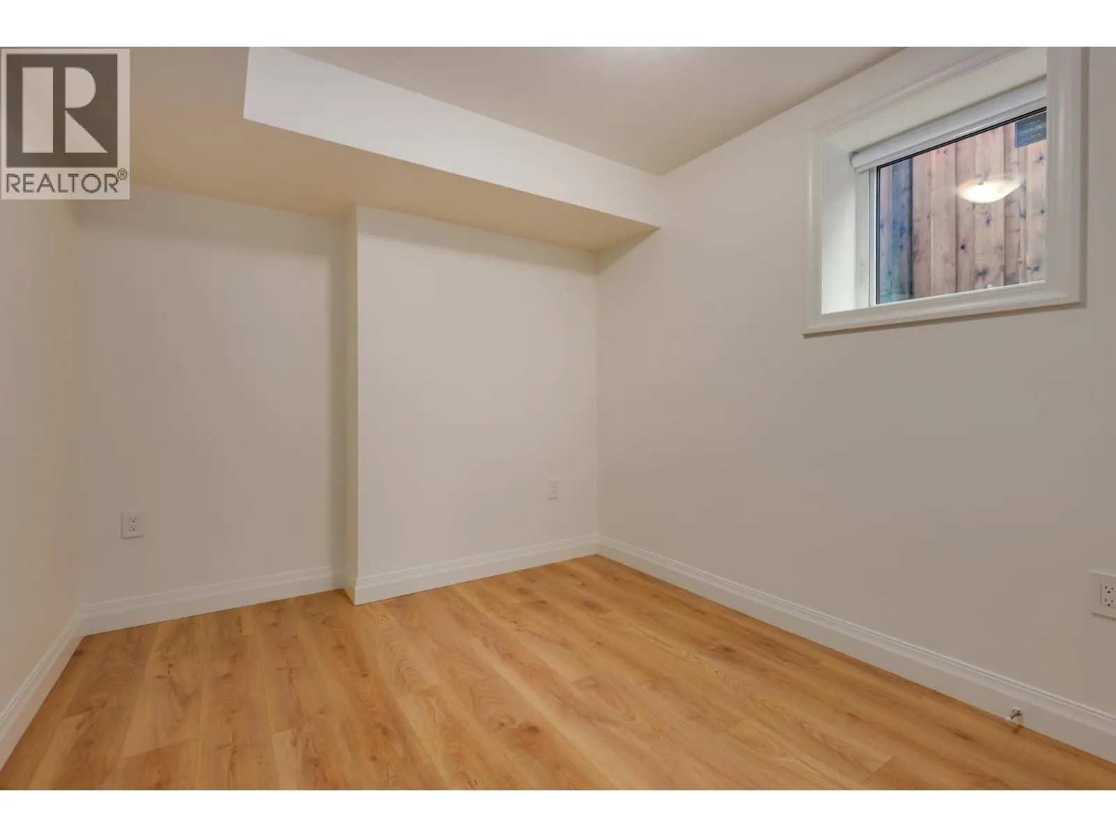 261 E 23RD STREET