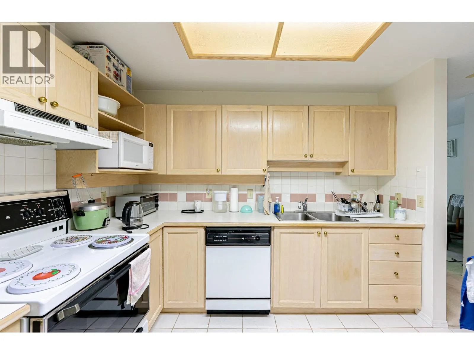 310 6737 STATION HILL COURT