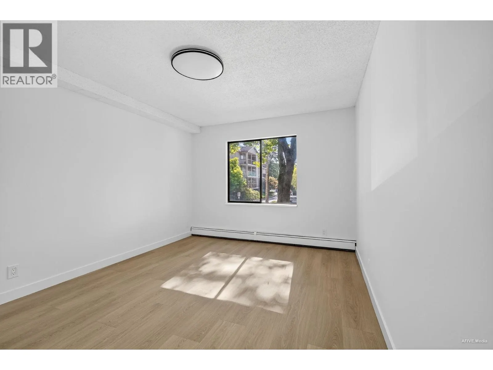 121 8511 ACKROYD ROAD