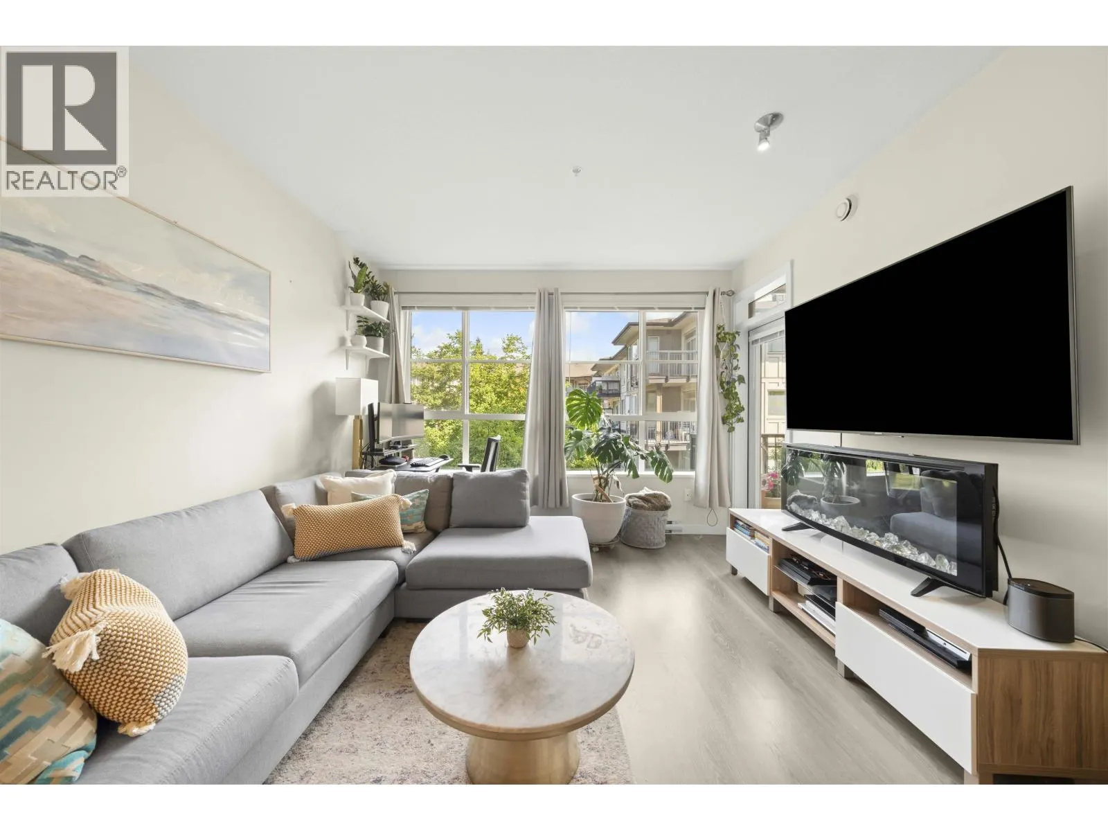 306 1152 WINDSOR MEWS