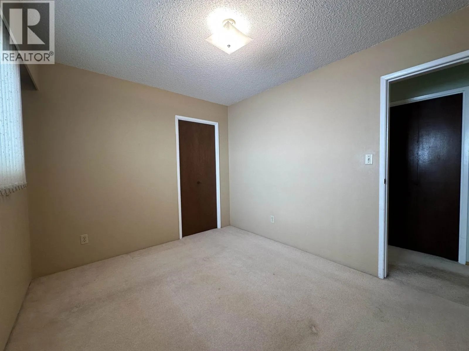 1542 WEST 65TH AVE
