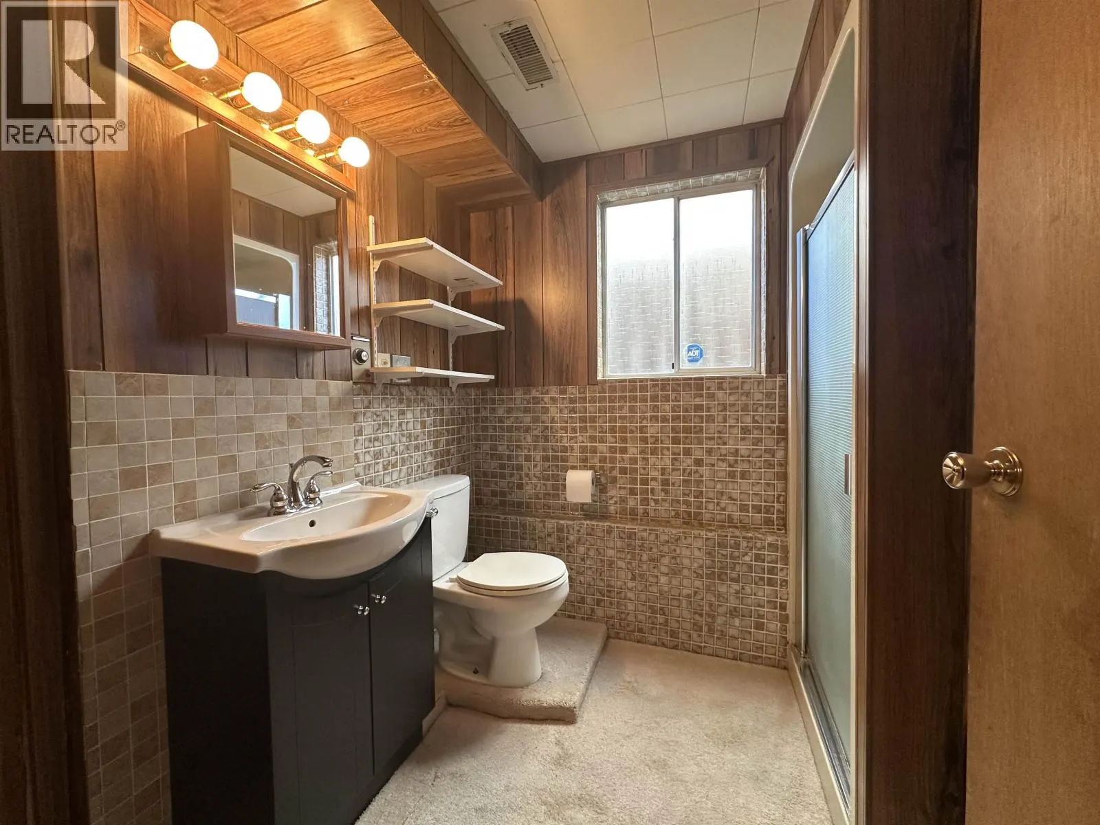 1542 WEST 65TH AVE