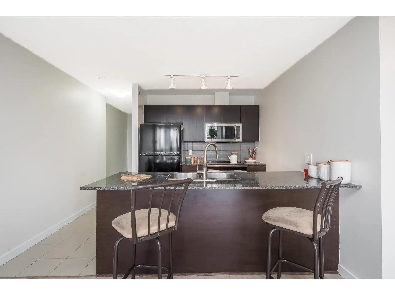 1102 13618 100 AVENUE