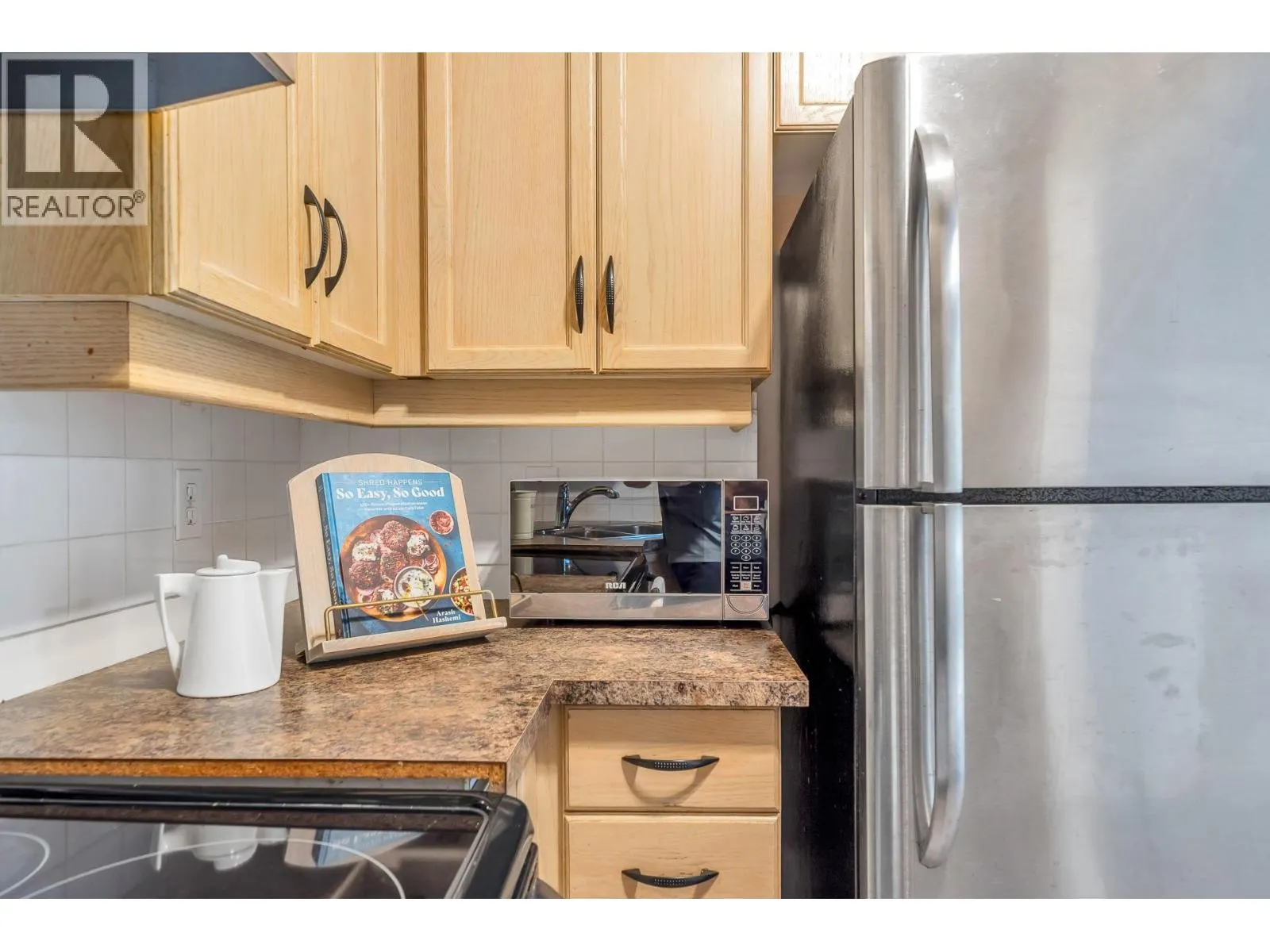 105 6742 STATION HILL COURT
