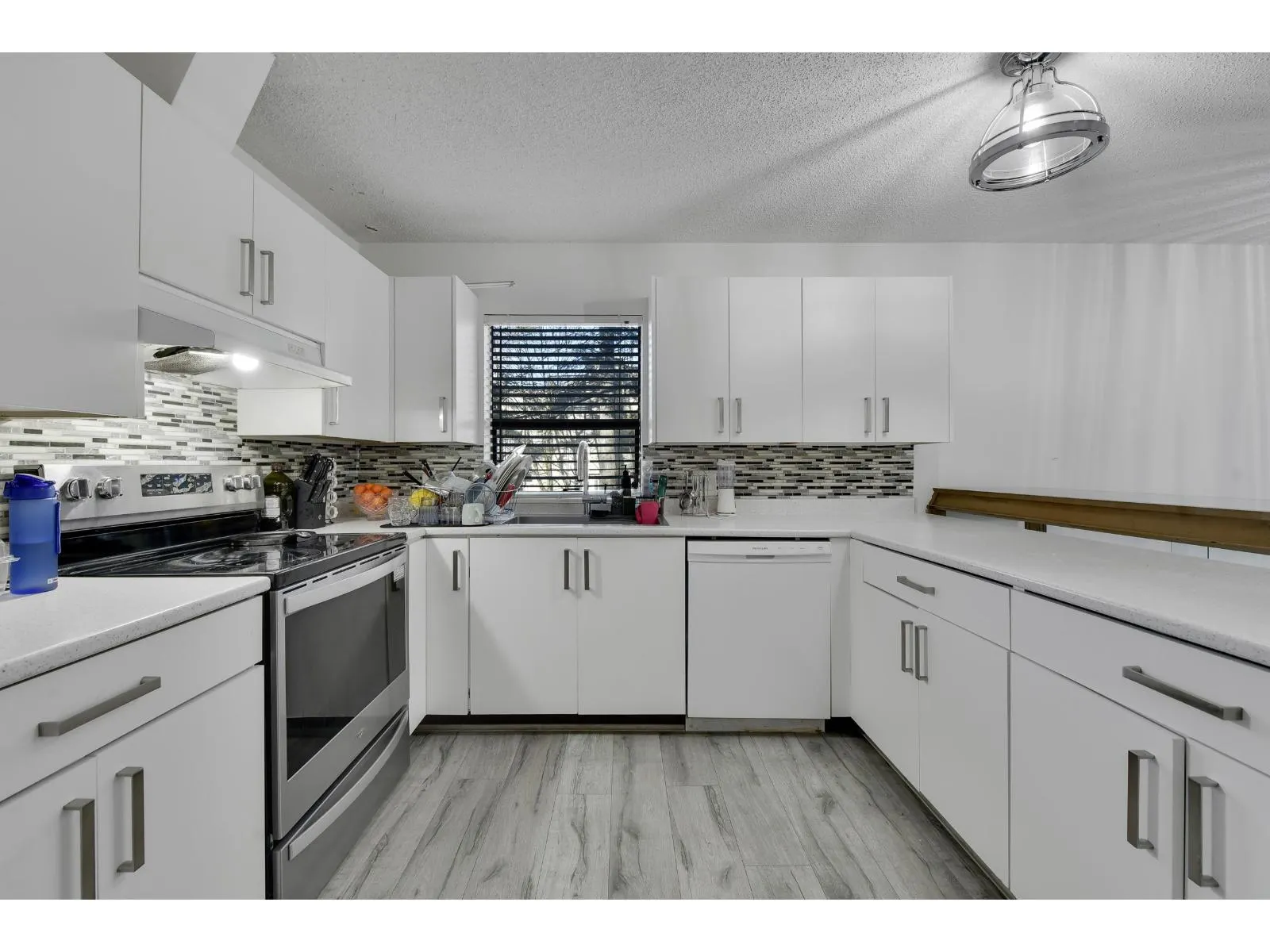 203 7064 133B STREET