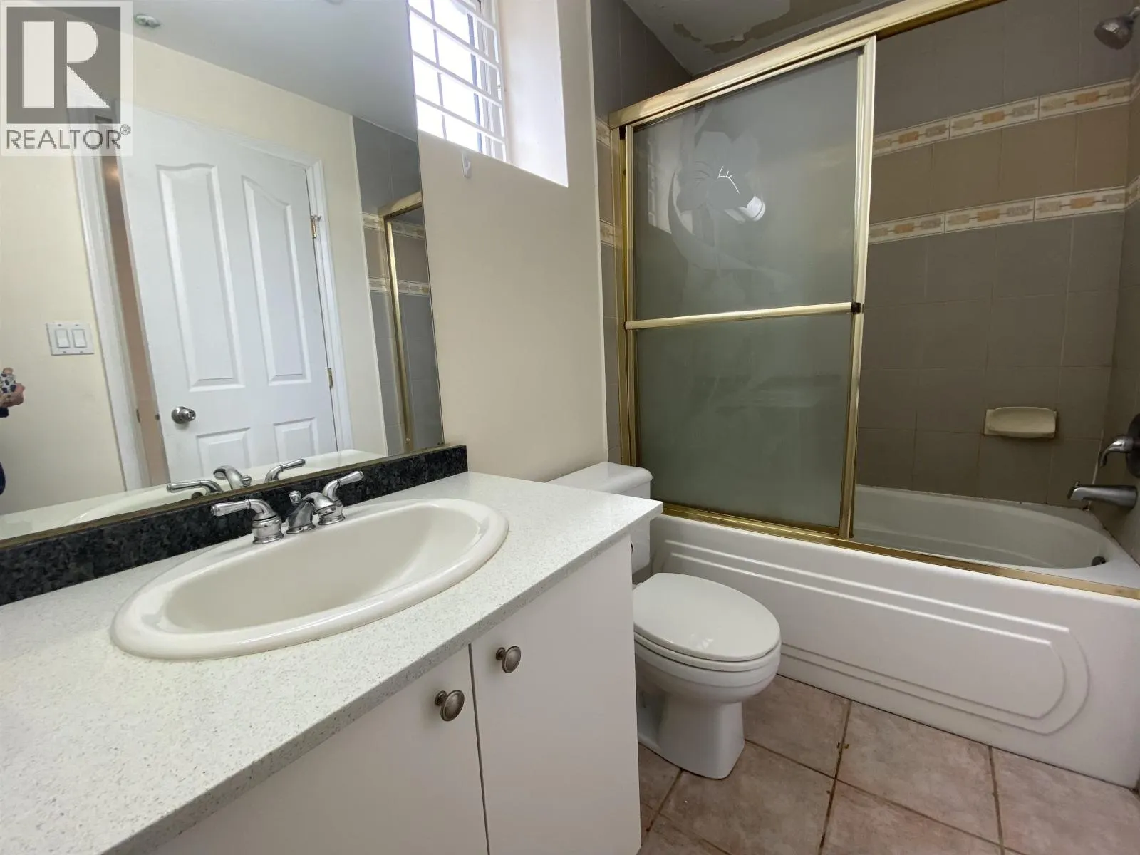 Half Basement 1688 E 59TH AVENUE